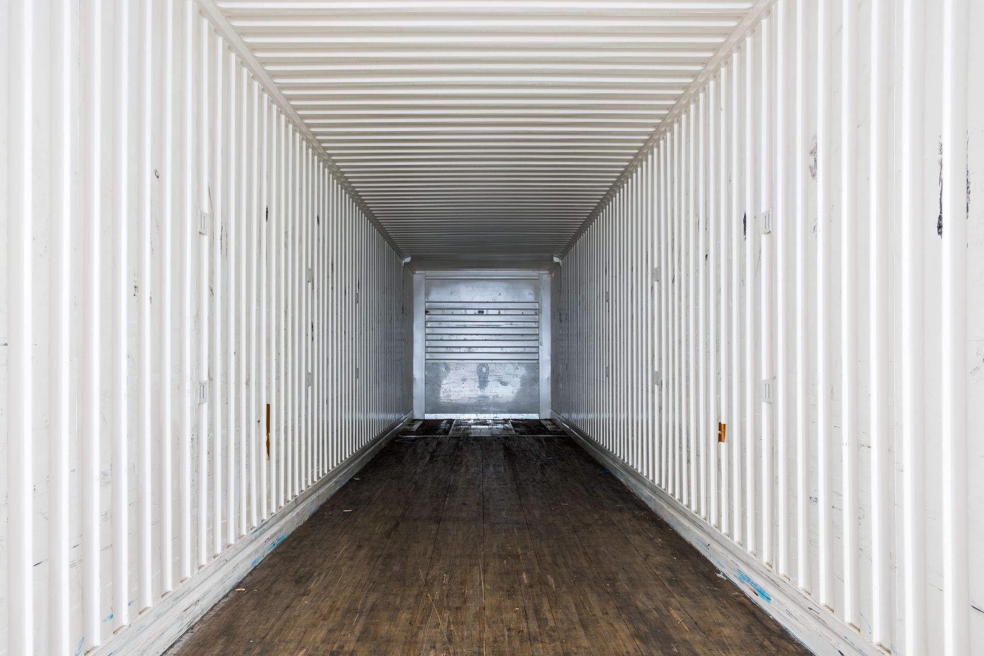 Interior view of empty semi truck dry van commercial trailer